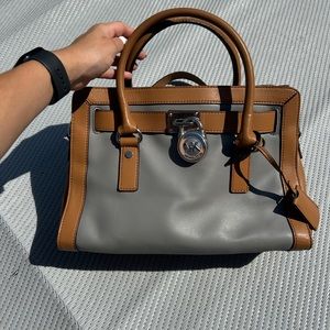 Essentially brand new Michael Kors purse! Worn maybe 4 times. No flaws!!